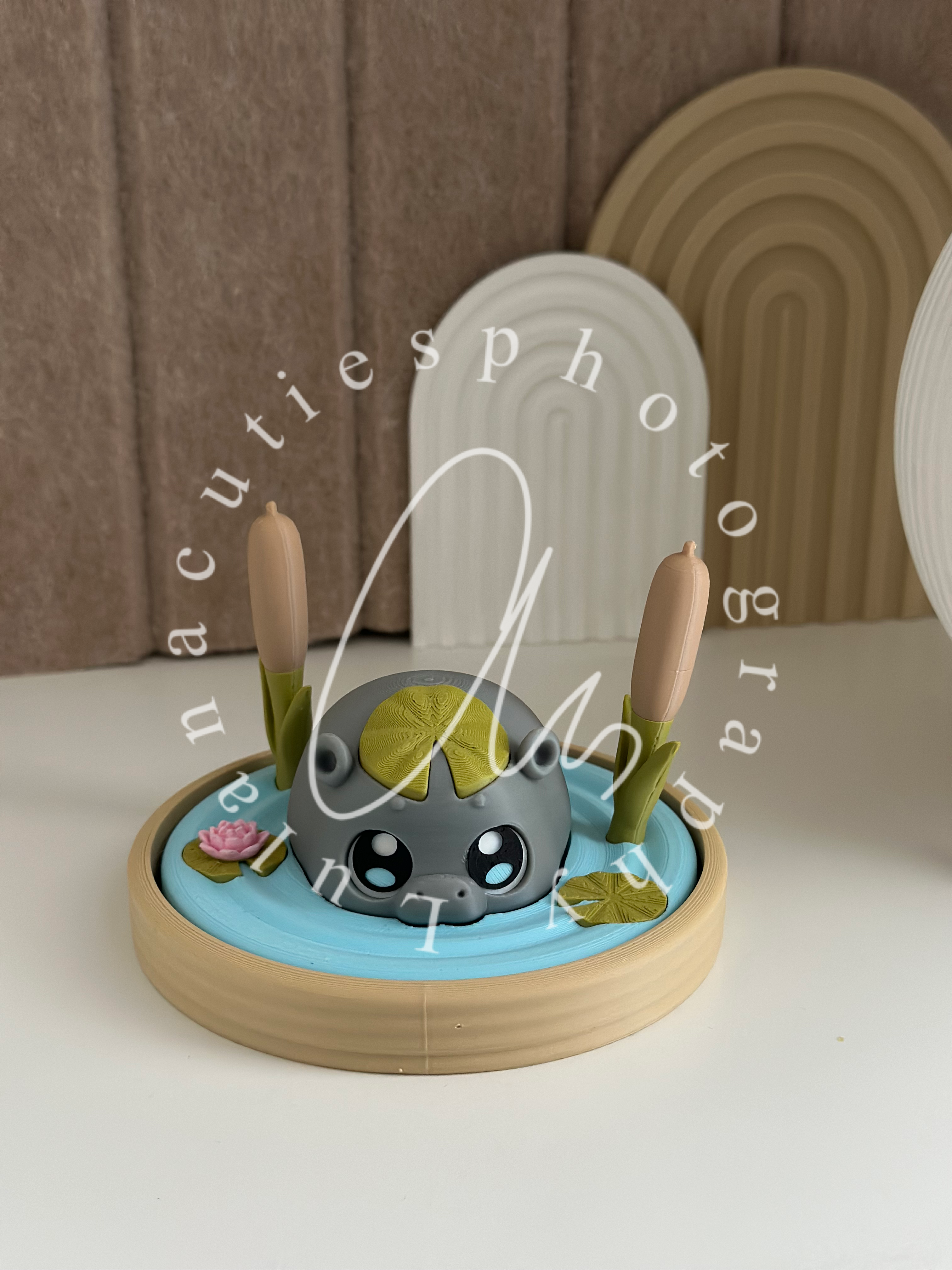 Nielpferd mit kleiner Landschaft